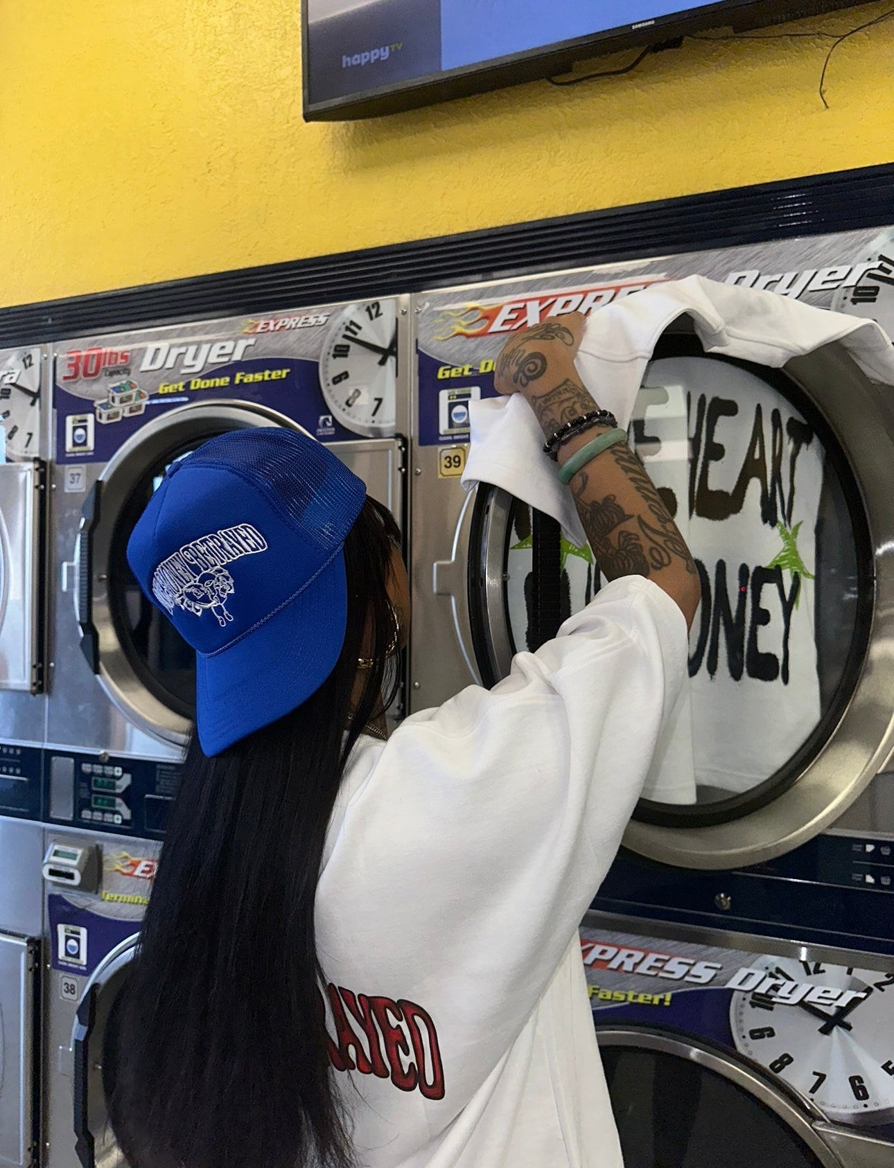 Love Money Betrayed Trucker Hat